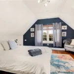 A comfortable, characterful room in a historic Charleston home