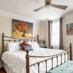 Van Gogh prints & rich hardwood floors create a warm, inviting atmosphere