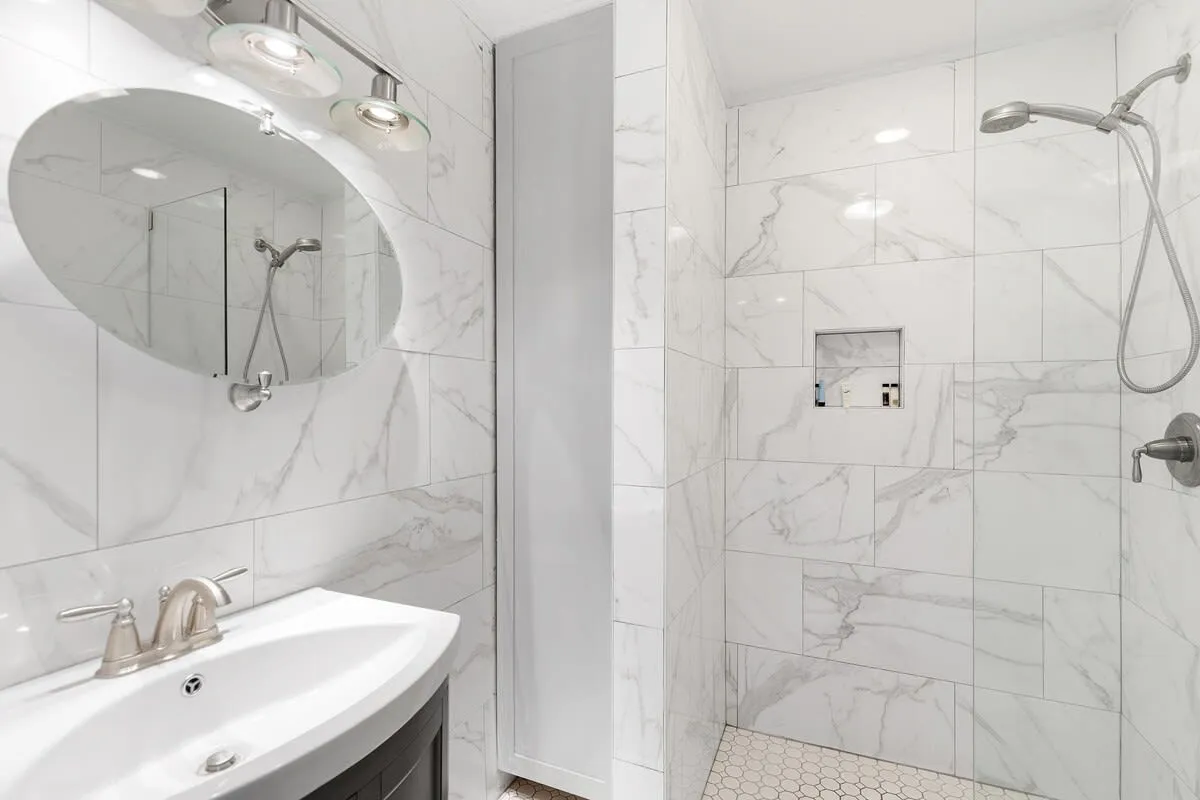A sleek, newly renovated modern wet room
