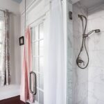 A private ensuite bathroom tucked into a historic gem